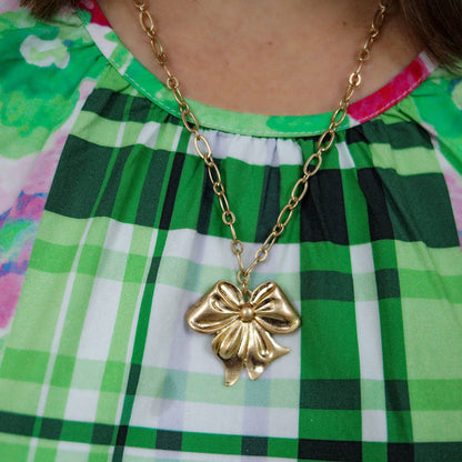 Sasha Bow Pendant Necklace in Worn Gold