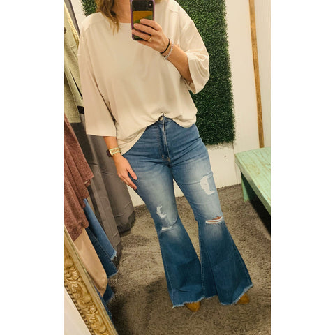 Distressed Denim Flare Raw Hem Jeans